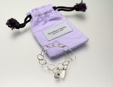 A Hamilton & Inches Edinburgh silver hammered circular chain link bracelet with hammered T-bar and a