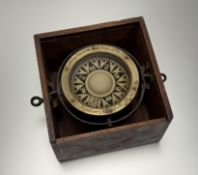 A cased gimbal brass compass by Mary Harden & Mary Ltd, Hythe Southampton.
