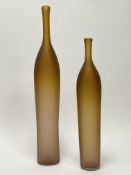 Robert Marshall (British, 1961-), a graduated pair of studio glass bottle vases of slender form,
