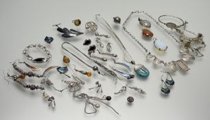 collection of silver and white metal jewellery to include an Egyptian-inspired necklace: l. x 26cm