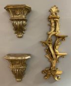 A pair of modern giltwood brackets, in the Italian Baroque style, together with a larger modern