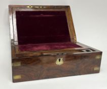 A Victorian brass bound mahogany writing slope, with fitted interior, glass ink pot, and burgundy