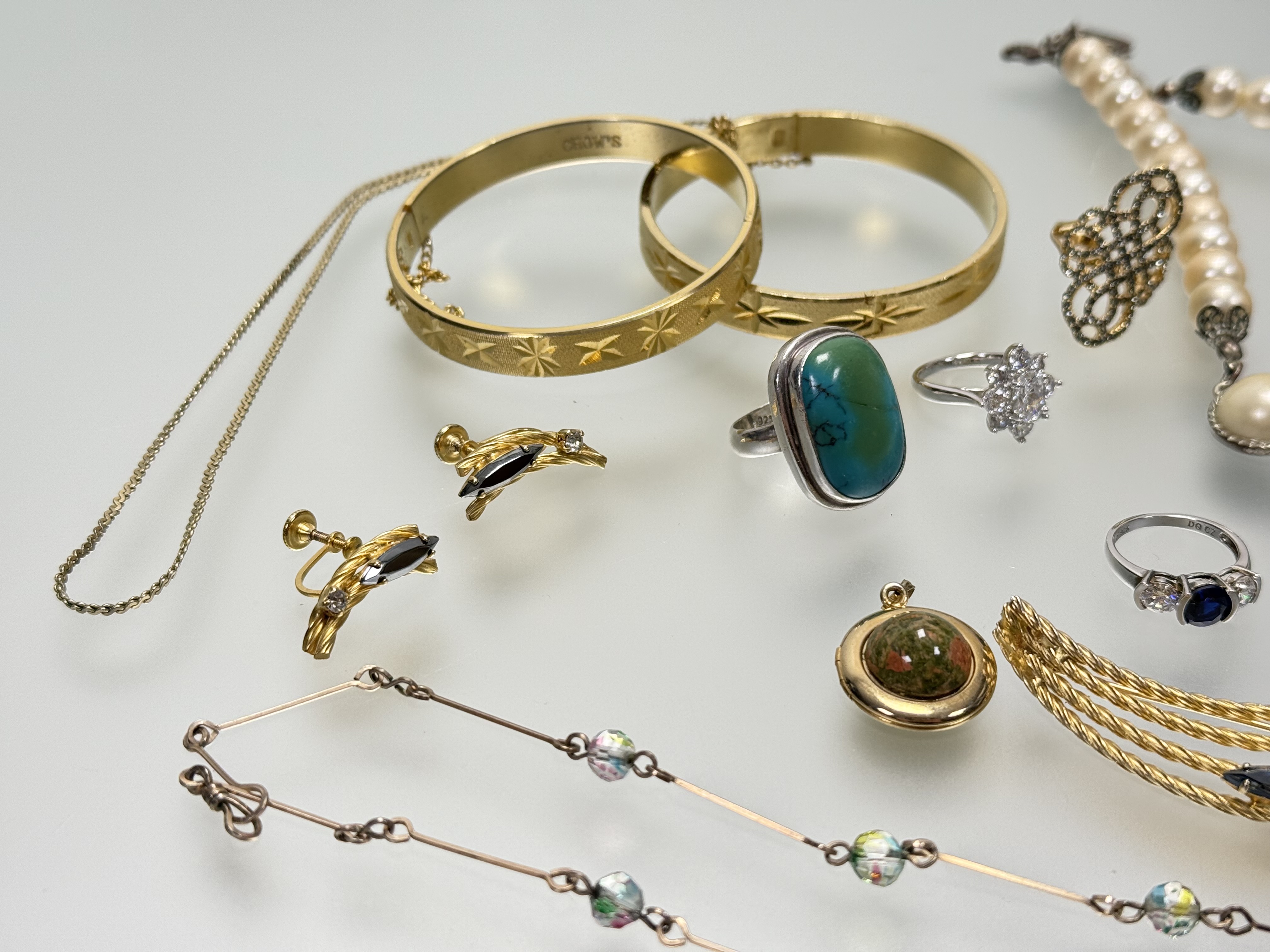 A collection of costume jewllery to include a silver CZ set cluster ring L/M 4.7g, a silver three - Image 3 of 3