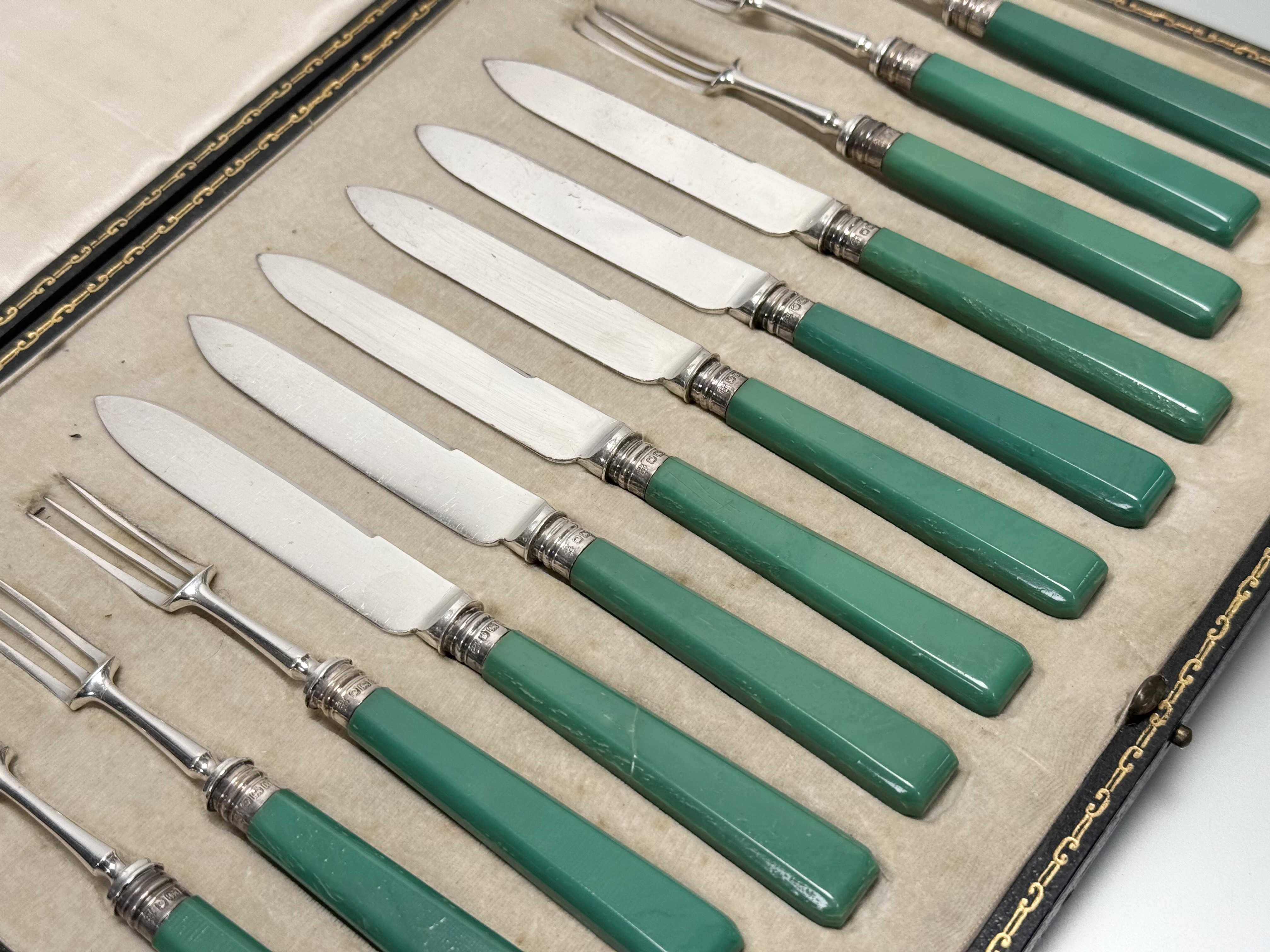 An Edwardian set of twelve pairs of epns bladed Sheffield silver mounted jade green plastic - Image 2 of 3