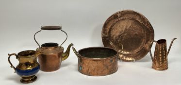 A collection of copper items, comprising a Victorian copper lustre jug with central blue panel (h.