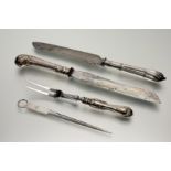 A Birmingham silver-handled carving fork with signs of hard solder marks rubbed: l. x 23cm