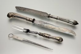 A Birmingham silver-handled carving fork with signs of hard solder marks rubbed: l. x 23cm