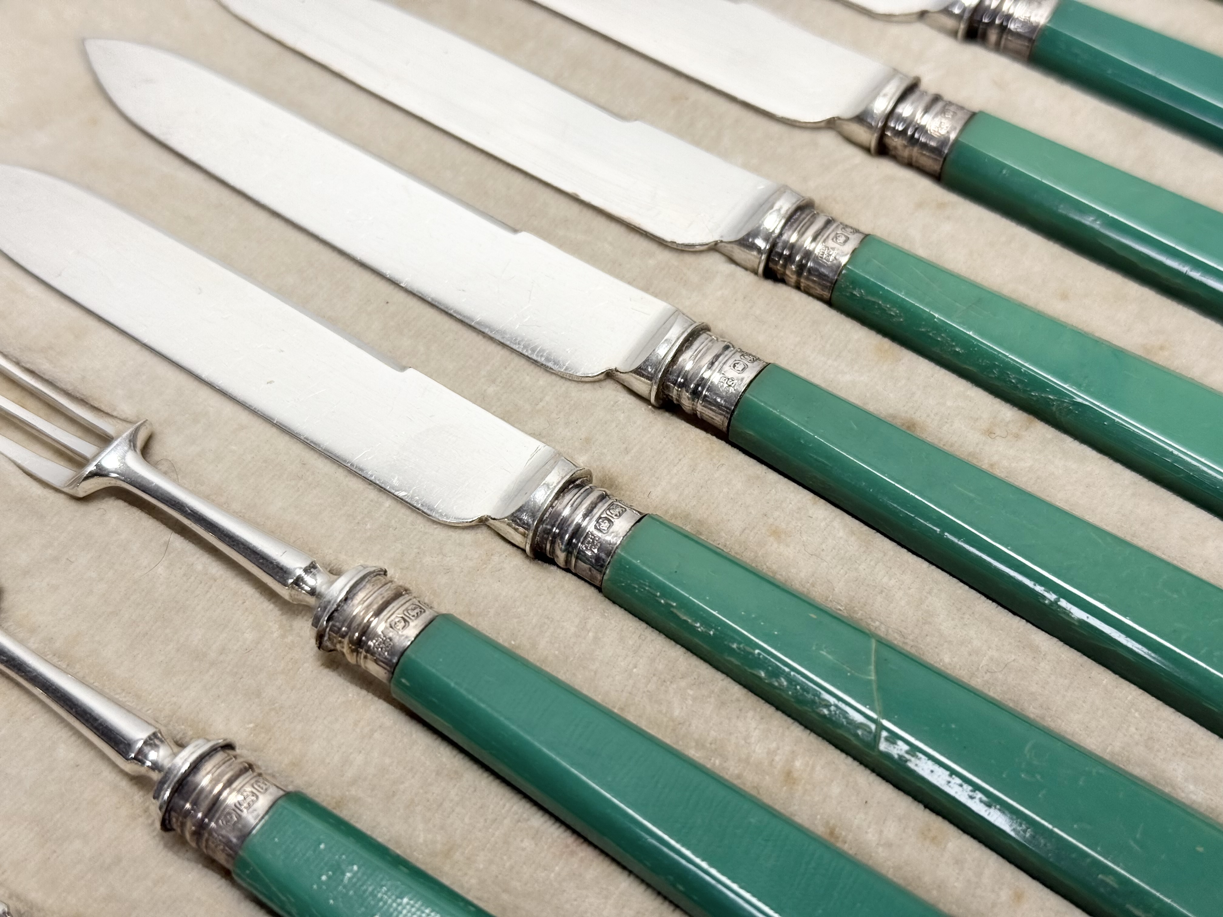An Edwardian set of twelve pairs of epns bladed Sheffield silver mounted jade green plastic - Image 3 of 3