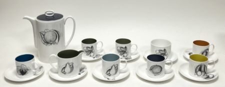 A Susie Cooper Bone China tea service in the 'Black Fruit' pattern, comprising seven coffee cans,