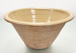 A large pottery brown glazed mixing bowl (h-22cm w-45cm).