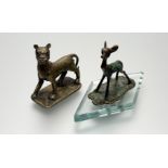 A 1920s/30s stylised verdegris bronze fawn figure mounted on damond shaped glass base: h. x 8cm l. x