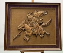 A carved wooden Samurai warrior on horseback, mounted on gold velour textile ground, framed. (