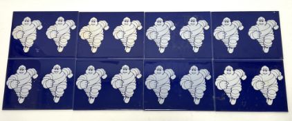 A collection of eight Bibendum 'Michelin Man' rectangular advertising tiles, made in Spain by