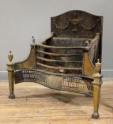 A Georgian-style brass and iron fire grate, in the Adam style with arched backplate and urn