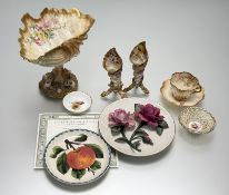 A collection of various decorative wares comprising, a Nautilus Porcelain shell shaped bon bon