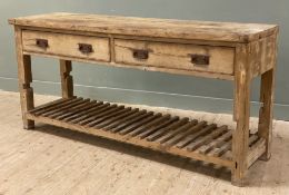An early 20th century pine country house pantry console table, rectangular top over two drawers
