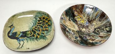 A Chelsea Pottery footed dish by Joyce Morgan, decorated with a peacock in blue, orange, and green