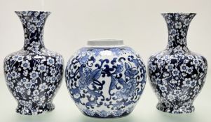 A pair of Wood & Sons blue and white prunus pattern vases (h-27cm) together with a blue and white