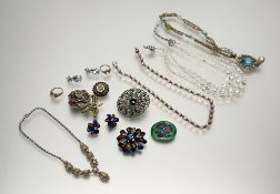 An Austrian iredescent three stand graduated faceted crystal bead necklace: l. x 20cm together