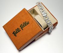A Folli Follie silver quartz bracelet wristwatch with mother of pearl dial with extra link in