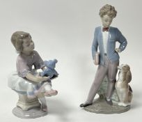 A Lladro porcelain figurine 'Best Friend', modelled as a young girl playing with a teddy, No.