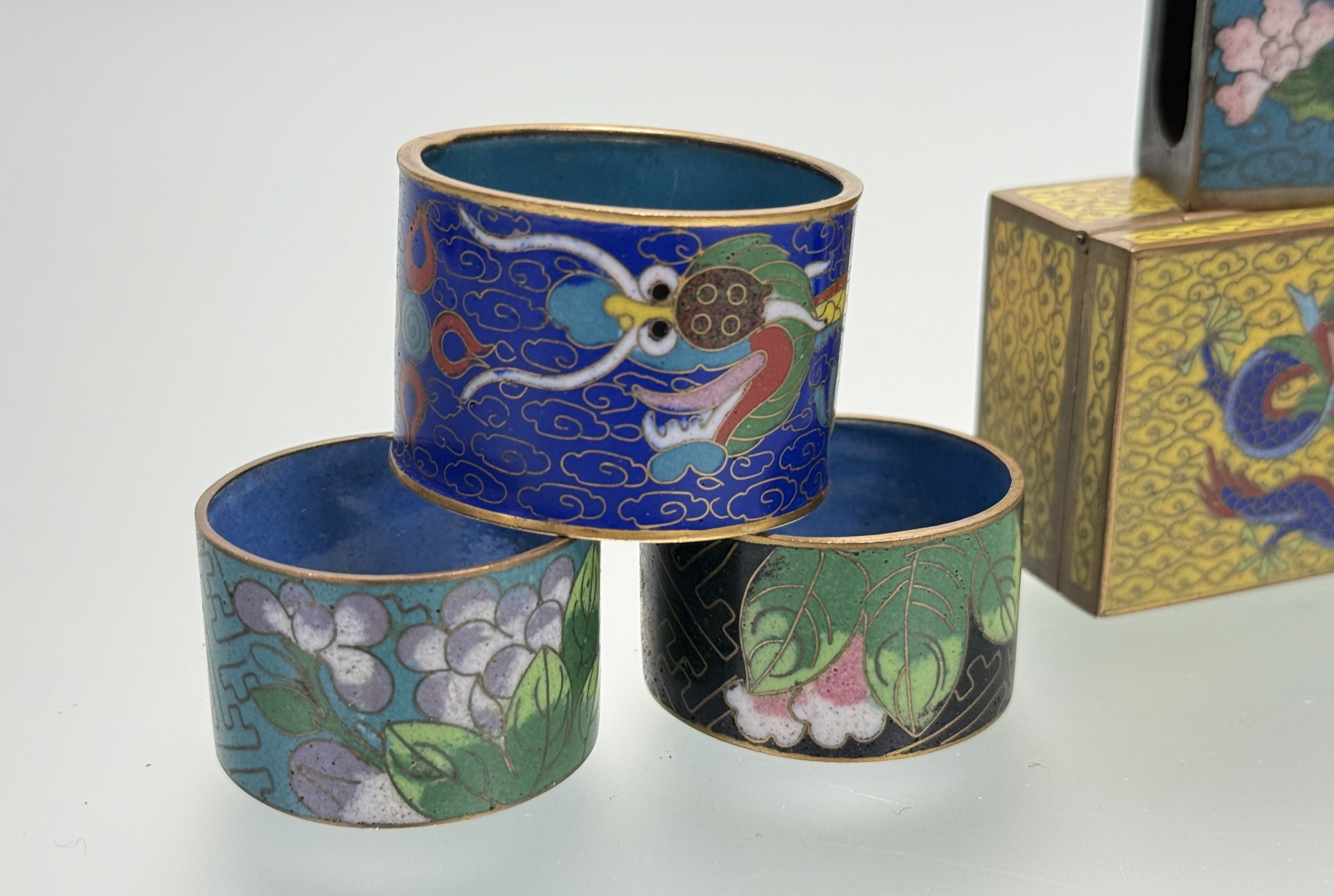 A collection of seven various Chinese cloisonne napkin rings decorated with dragon, flowers and - Image 2 of 5