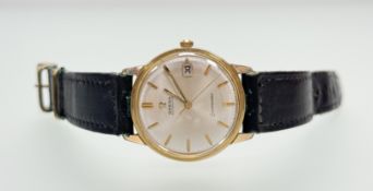 A Vintage Omega automatic gilt metal and stainless steel Seamaster with baton hour markers and