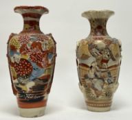An early 20thc Japanese Satsuma earthenware vase decorated with figures within landscape scenes in