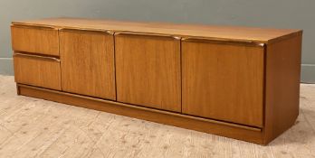 A mid-century teak sideboard, fitted with two graduated drawers and three cupboard doors to front,