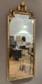 A late 19th century Regency-style pier mirror, giltwood carved pediment over stepped mirror plate