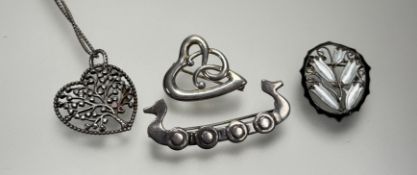 A Ola Gorie Orkney silver longboat brooch: l. x 5cm 5.6g together with a Celtic heart brooch: h. x