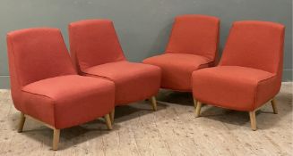 A set of four lounge chairs by Made.com, upholstered in terracotta fabric raised on splayed turned