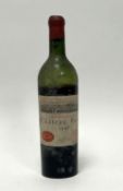 A bottle of 1947 Château Pavie, Saint-Emilion Premier Grand Cru, sealed, level below shoulders, very