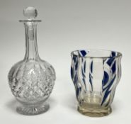 A brandy decanter with diamond cut glass decoration to body and elongated neck, with faceted stopper