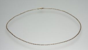 A 9ct gold chain link necklace with ring fastening: l. x 23cm 3.57g