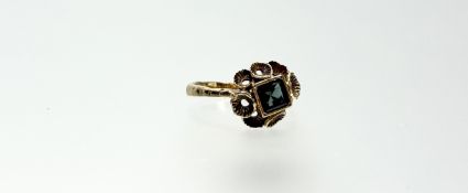 A 14ct gold green tourmaline dress ring, the square-cut stone in a collet setting within a band of