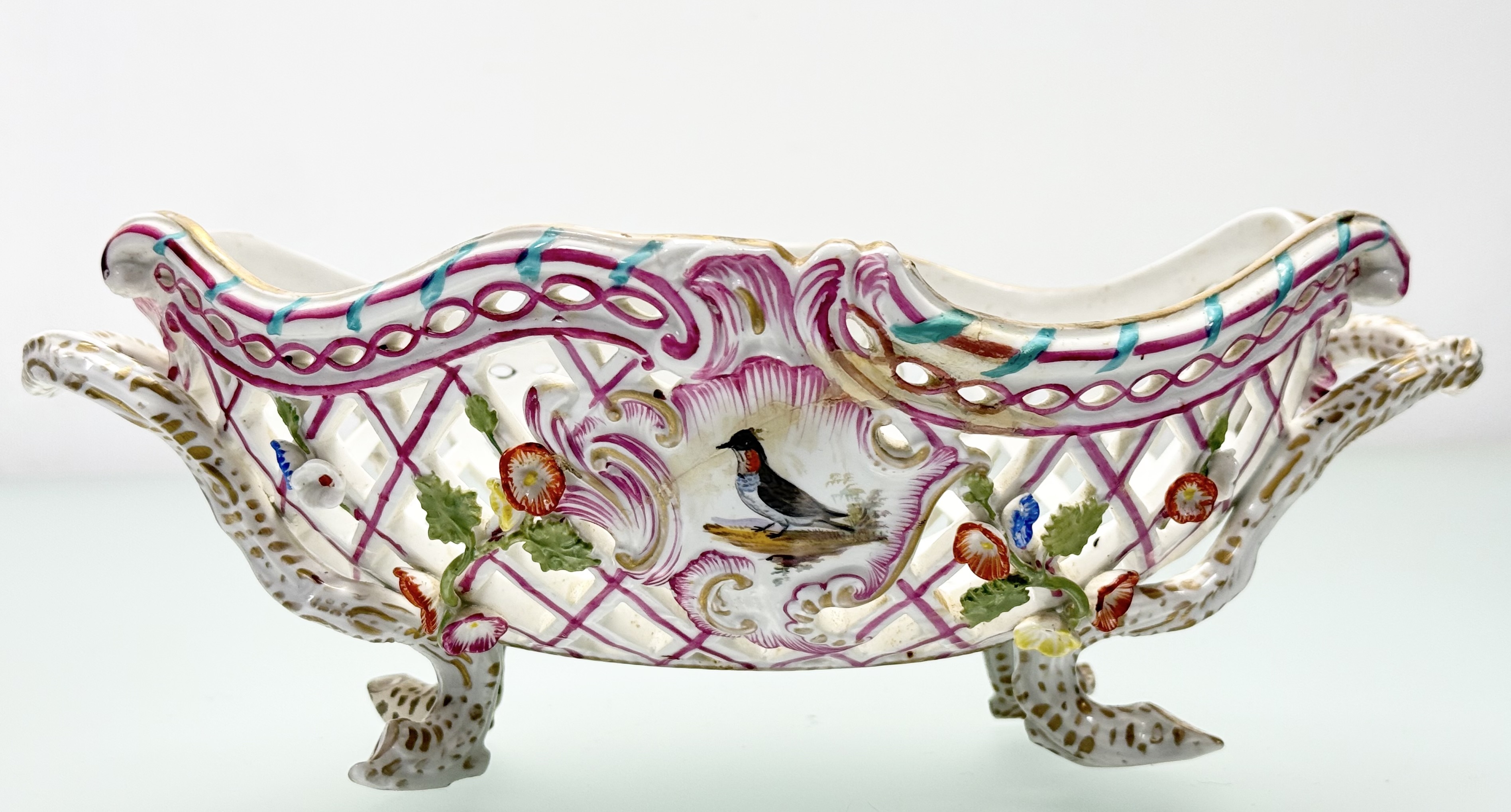 A pair of K.P.M. Berlin porcelain baskets, 19th century, oval, reticulated and floral-encrusted, - Image 4 of 7