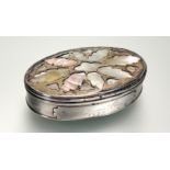 An 18th century mother-of-pearl inlaid silver (unmarked) snuff box, oval, the inside of the cover