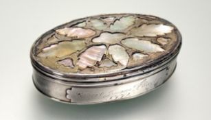An 18th century mother-of-pearl inlaid silver (unmarked) snuff box, oval, the inside of the cover
