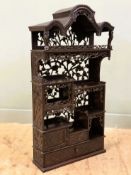 A Chinese carved table top display cabinet, probably Hongmu, late Qing Dynasty, c. 1900, with