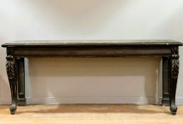 An early 19thc dark stained pine hall console table, the rectangular top with moulded edge on