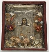 A late 19th century Eastern Orthodox icon of Christ Pantocrator, the painted face and hands within a
