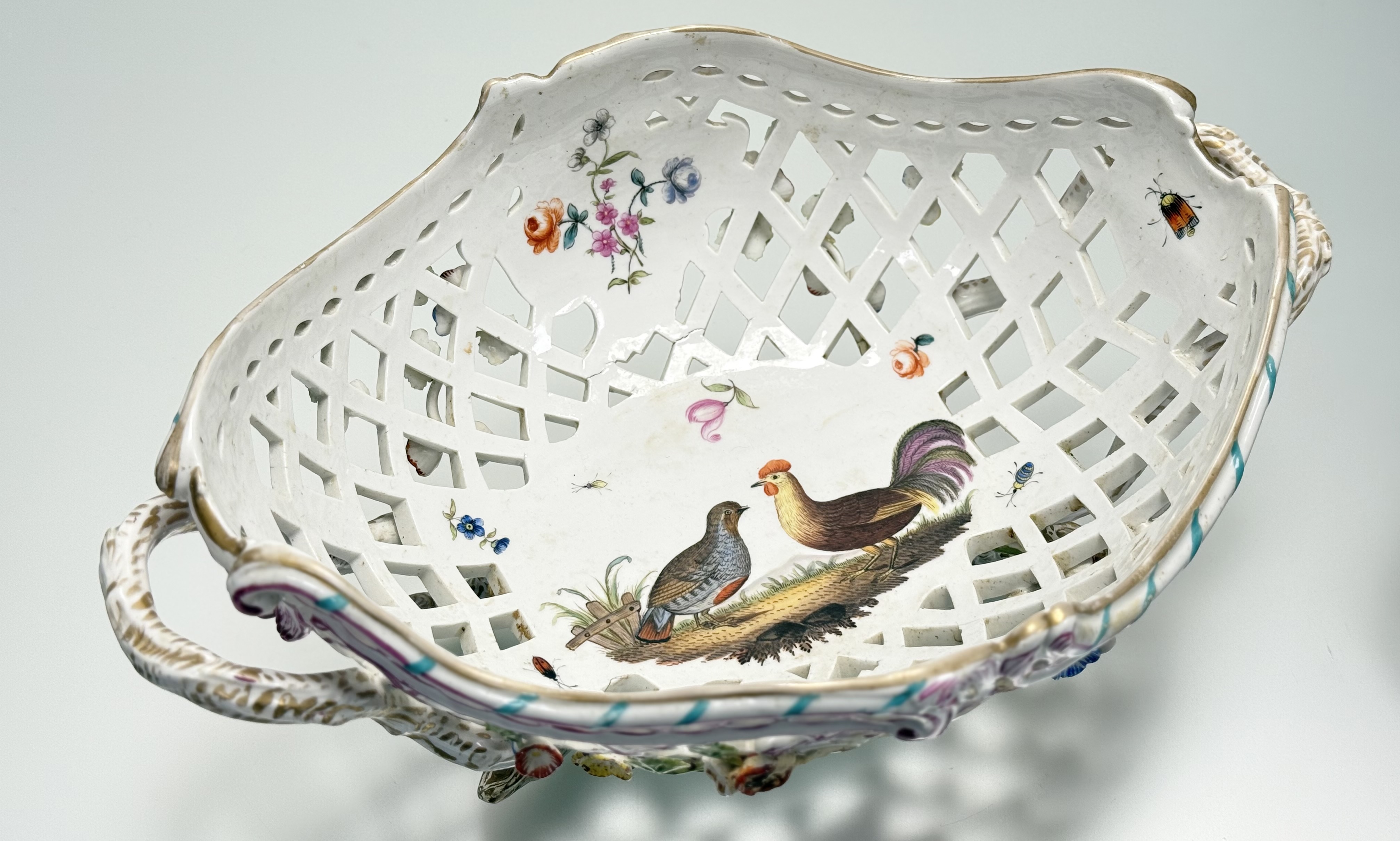 A pair of K.P.M. Berlin porcelain baskets, 19th century, oval, reticulated and floral-encrusted, - Image 3 of 7