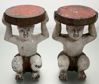 A pair of South-East Asian carved wooden and polychrome painted stools, each modelled as a crouching
