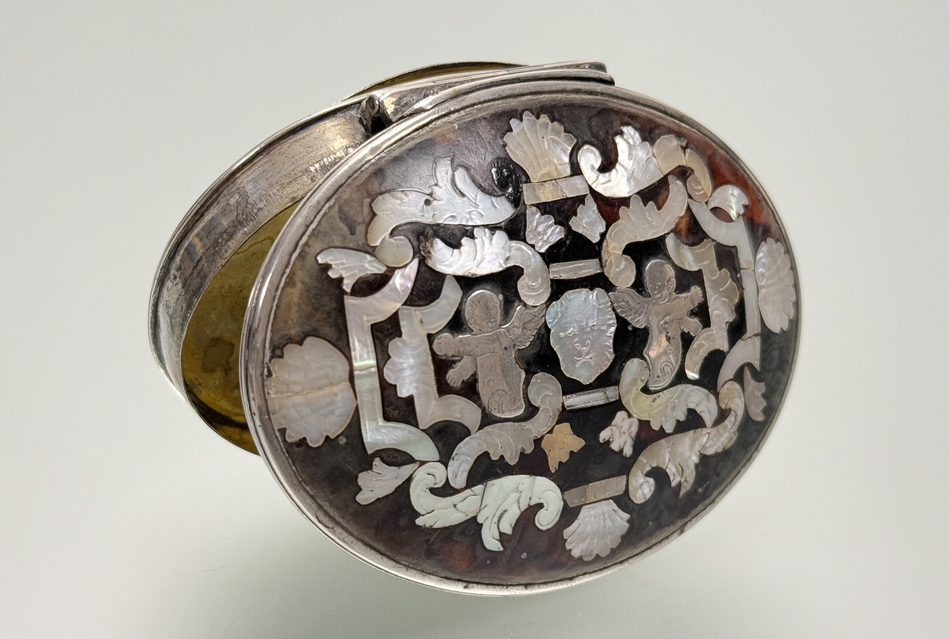 An 18th century mother-of-pearl inlaid tortoiseshell and silver (unmarked) snuff box, oval, the - Image 2 of 3