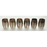 A set of six white metal beakers, probably Indian early 20th century, of barrel form, each