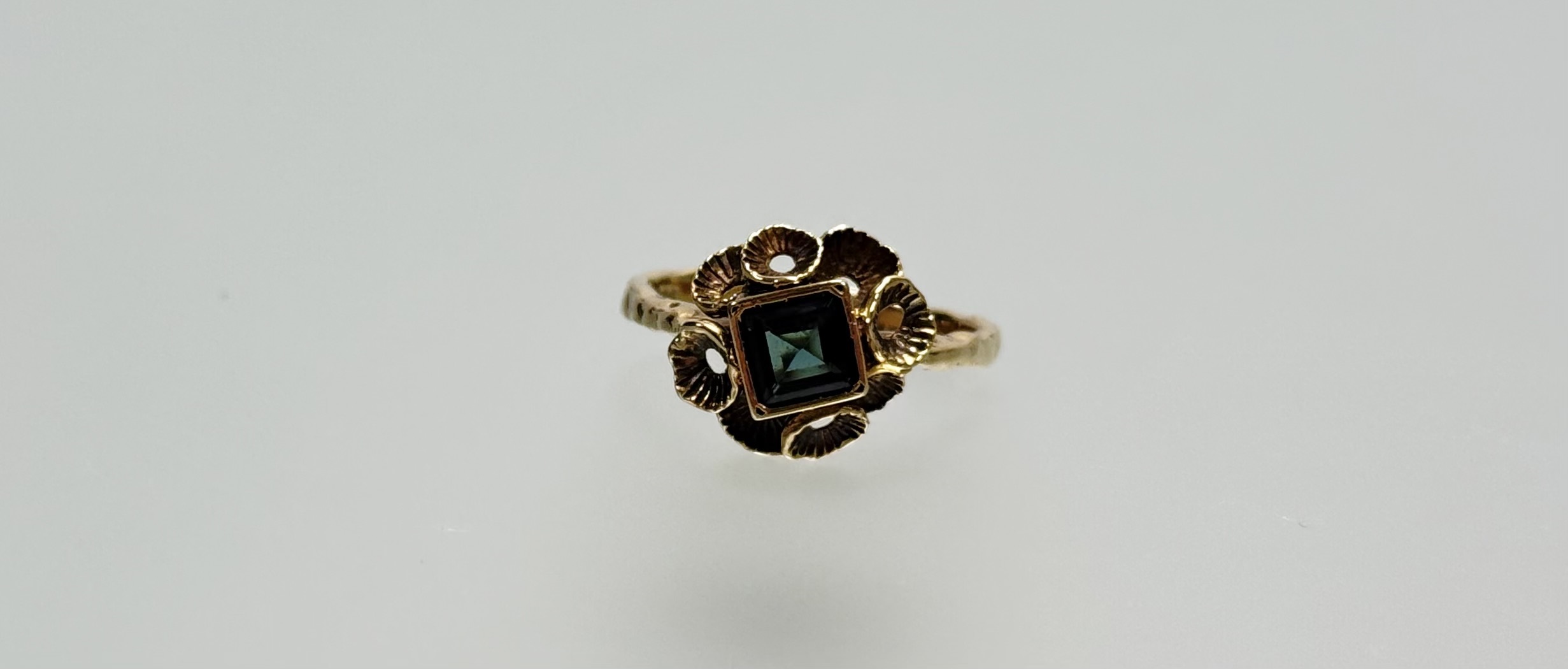 A 14ct gold green tourmaline dress ring, the square-cut stone in a collet setting within a band of - Image 2 of 2