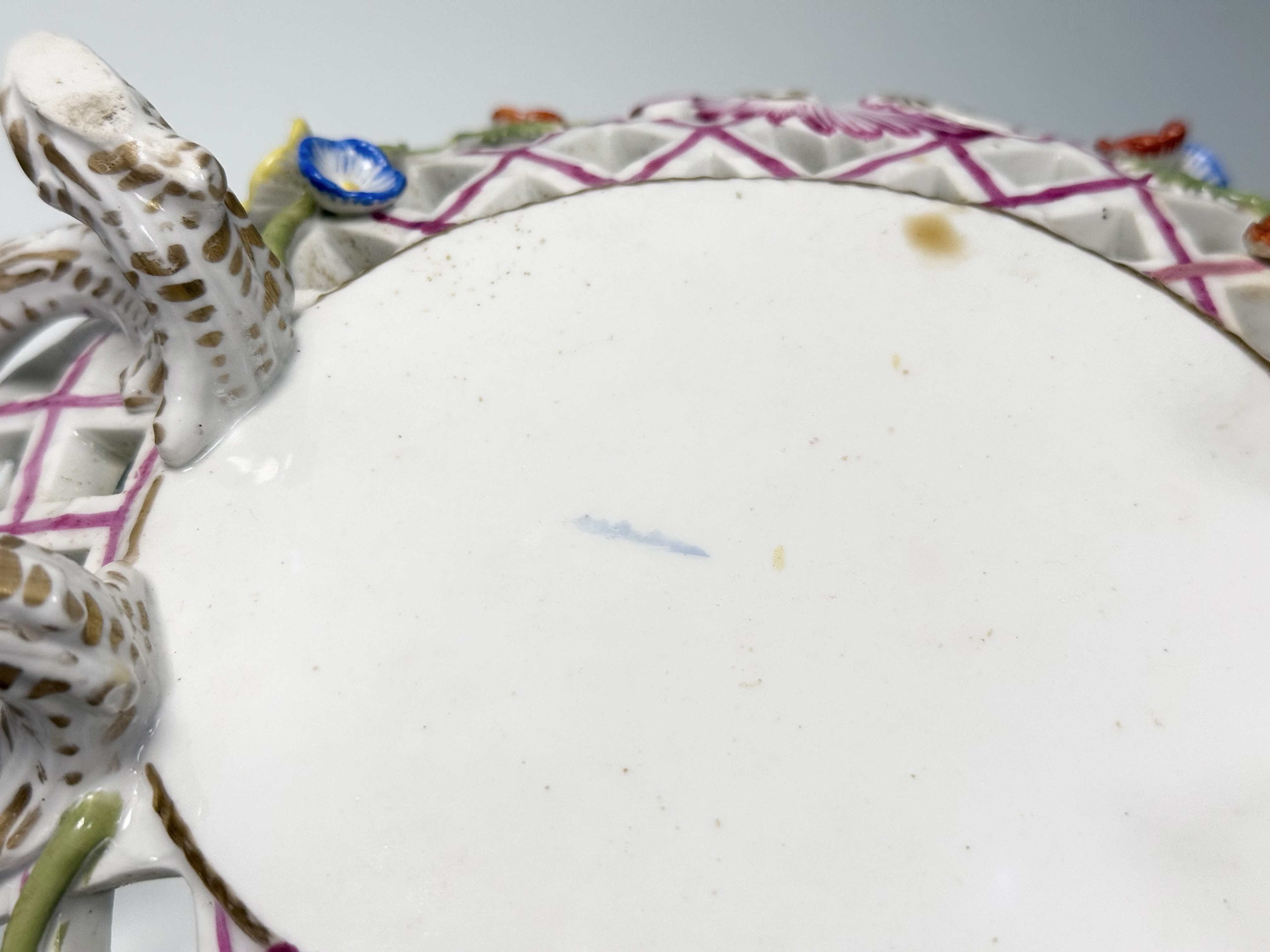 A pair of K.P.M. Berlin porcelain baskets, 19th century, oval, reticulated and floral-encrusted, - Image 6 of 7