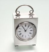 A late Victorian silver desk or dressing table clock, Douglas Clock Co., Birmingham 1900, of