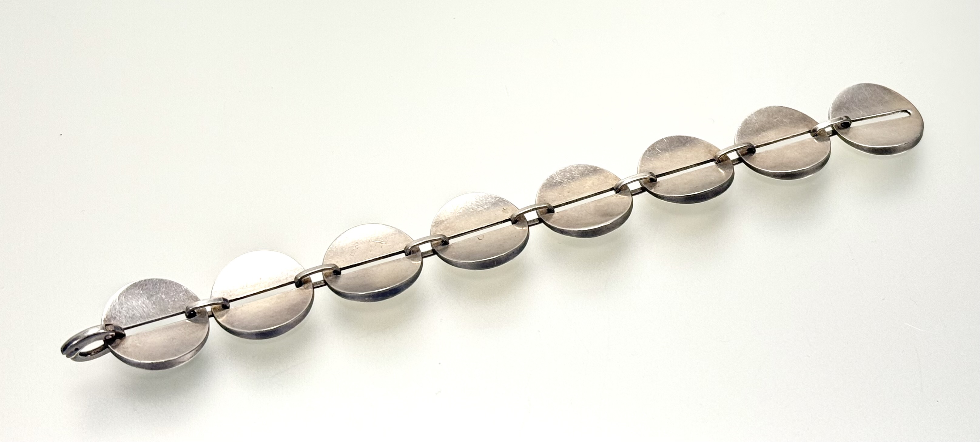 Georg Jensen, a sterling silver bracelet, no.151, designed by Nanna Ditzel, of eight pierced disc- - Image 2 of 3